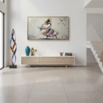 Gestural figurative hand-painted canvas depicting a twirling girl in flowing colorful dress with autumn leaves, soft neutral palette, contemporary hallway
