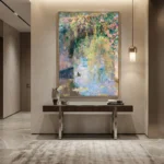 Impressionist hand-painted canvas depicting a flowering garden archway reflected in water, soft pastels and luminous yellows, contemporary entryway