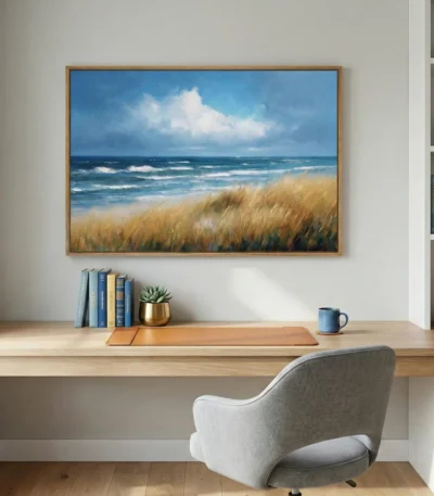 Impressionist coastal landscape hand-painted canvas with windswept golden dunes, turquoise ocean waves, and dramatic cloudy sky, contemporary workspace