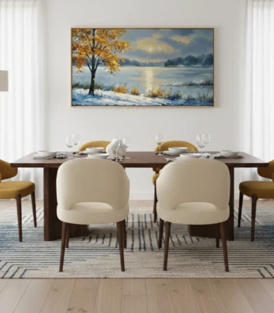 Impressionist landscape hand-painted canvas depicting a golden tree by a snowy winter lake, cool blue and warm ochre palette, dining space setting