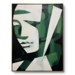 Cubist portrait painting, a white profile face fragmented into sharp angular green and black shards, thin gold frame