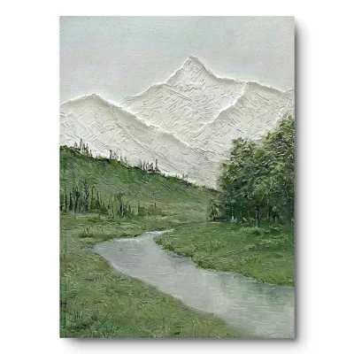 Textured painting of white relief mountains above a green valley with a winding stream and pine trees, light wood frame