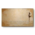 Panoramic ochre palette-knife horizon painting with a small silhouette figure walking along a golden textured shore, slim gold frame.