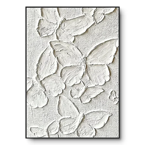 All-white plaster relief of layered overlapping butterfly-wing shapes, black thin frame