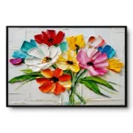 Textured painting of a colourful flower bouquet in a glass vase against cream, black frame