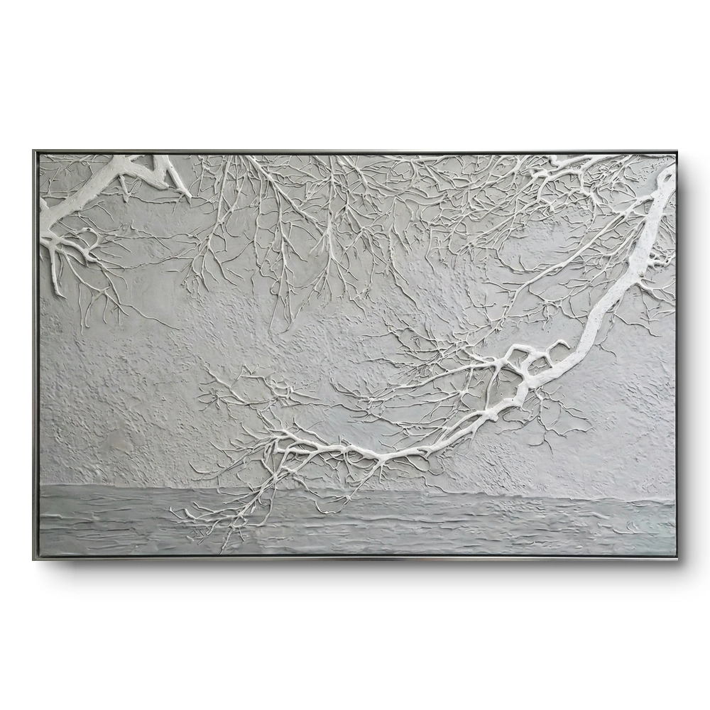 winter-frost-white-branches-on-textured-grey-minimal-wall-art Textured relief painting of raised white frosted branches against a grey wall and water horizon, black thin frame