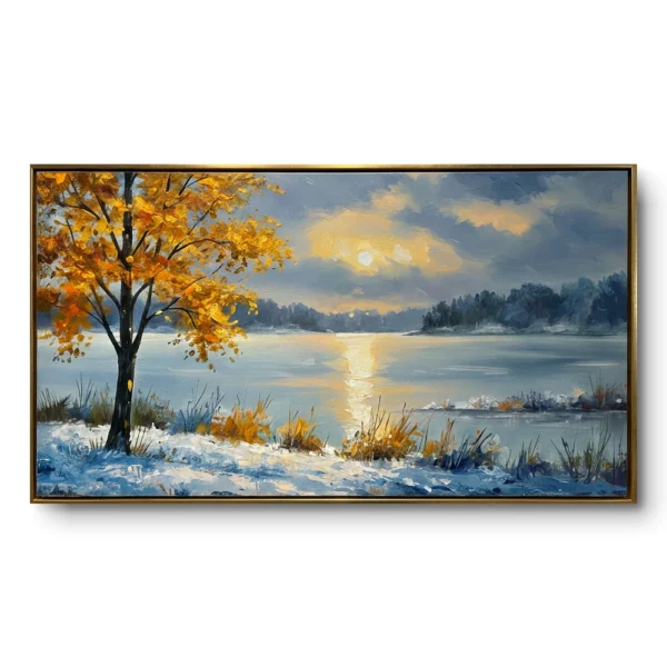 Realist winter landscape painting of a golden autumn tree with snow at its base beside a still lake with a glowing sun reflection, gold thin frame