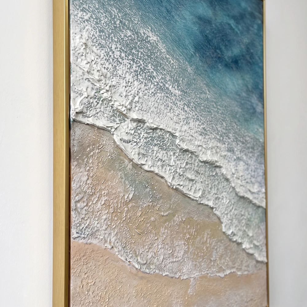 Overhead Tide textured wall art shown framed on the wall in a styled interior