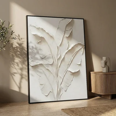 Sculpted Frond textured wall art shown framed on the wall in a styled interior