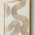 Wave Harmony textured wall art shown framed on the wall in a styled interior