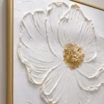 Petal Sculpt textured wall art shown framed on the wall in a styled interior