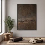 Somber Terrain textured wall art shown framed on the wall in a styled interior