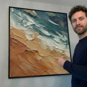 Textured abstract hand-painted canvas in layered teal, cream, and terracotta tones, contemporary space