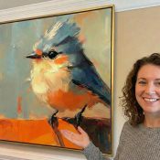 Gestural contemporary hand-painted canvas depicting a blue jay with orange breast in expressive brushstrokes, warm neutral interior