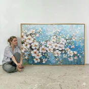 Contemporary impressionist hand-painted canvas of blooming cherry blossoms in white and gold against layered blue sky
